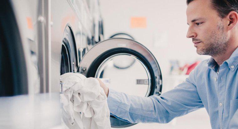 ¿Cuál es la diferencia entre las configuraciones "algodón / normal" y "prensa permanente" en una lavadora?