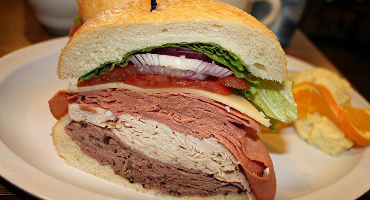 ¿Cuánta carne de almuerzo uso por sándwich?
