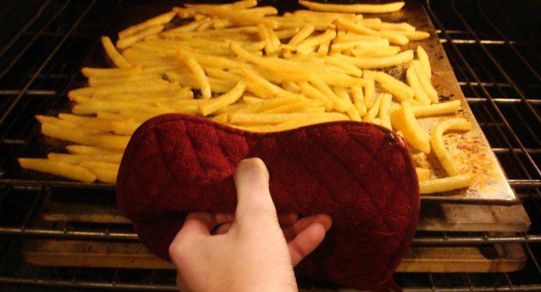 ¿Qué temperatura cocina patatas fritas congeladas?