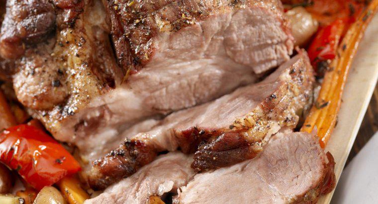 ¿Cuántos minutos por libra se debe cocinar el lomo de cerdo?