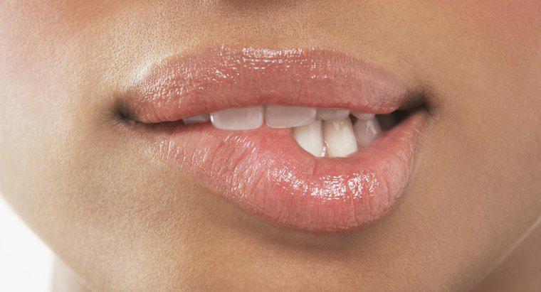 ¿Cuáles son los síntomas de una infección en la boca?