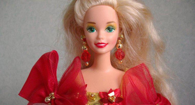 ¿Cuáles son los valores de Holiday Barbie Dolls?